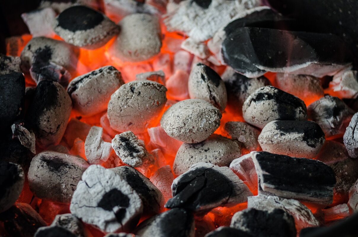 Glowing charcoal on a barbecue grill