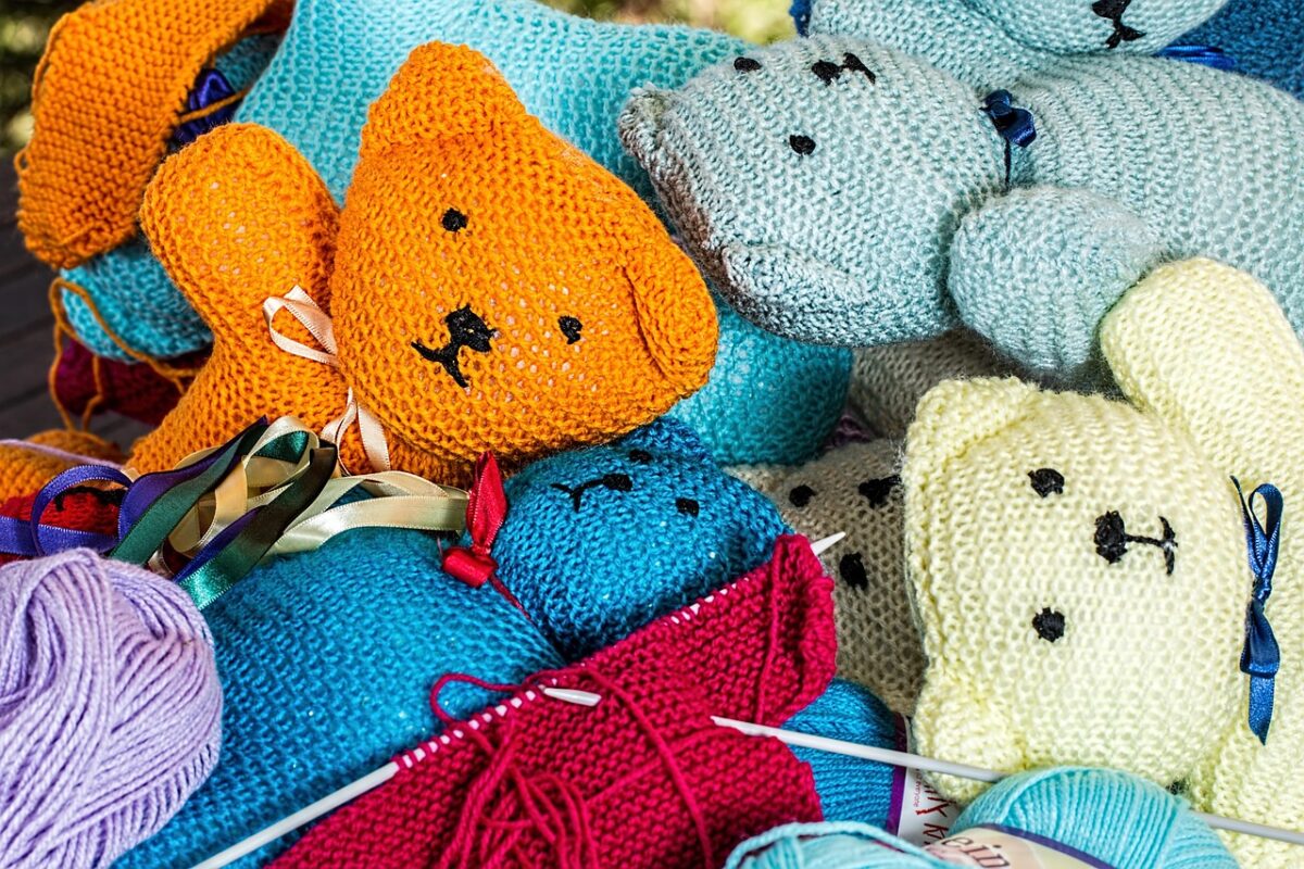 Balls of yarn with knitting needles