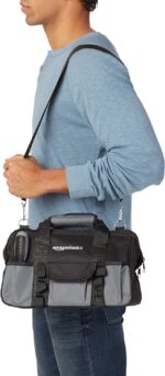 65-piece home repair tool kit with carry bag