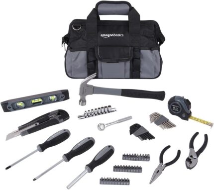 65-piece home repair tool kit with carry bag