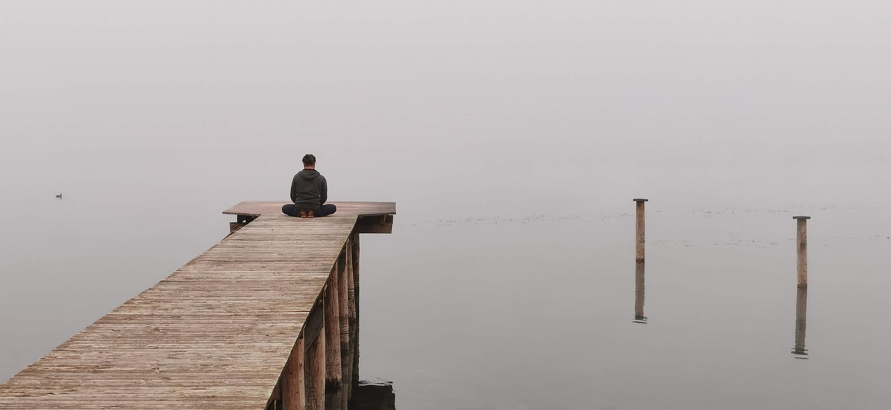 Open notebook and meditation guide on a quiet desk