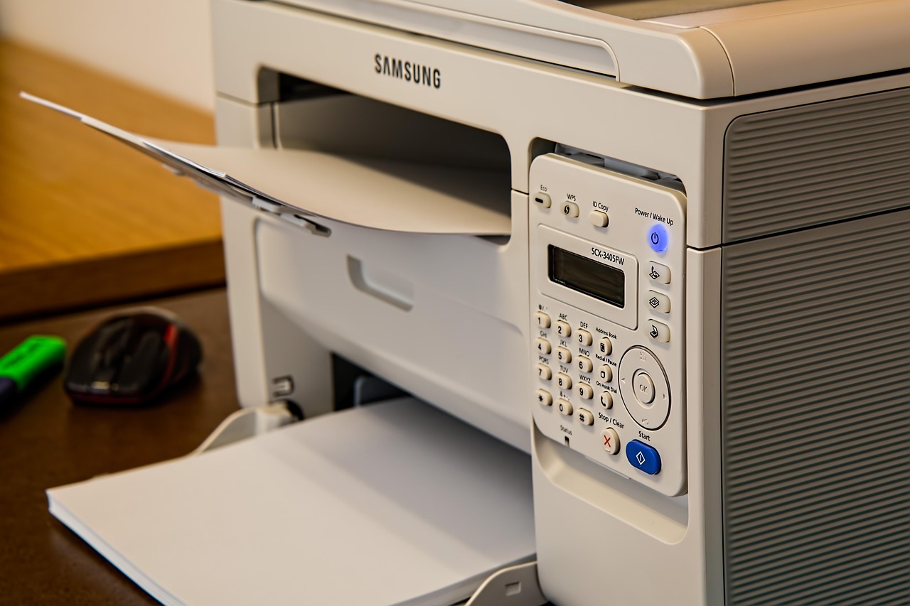 Desktop printer standing on a mobile office cabinet