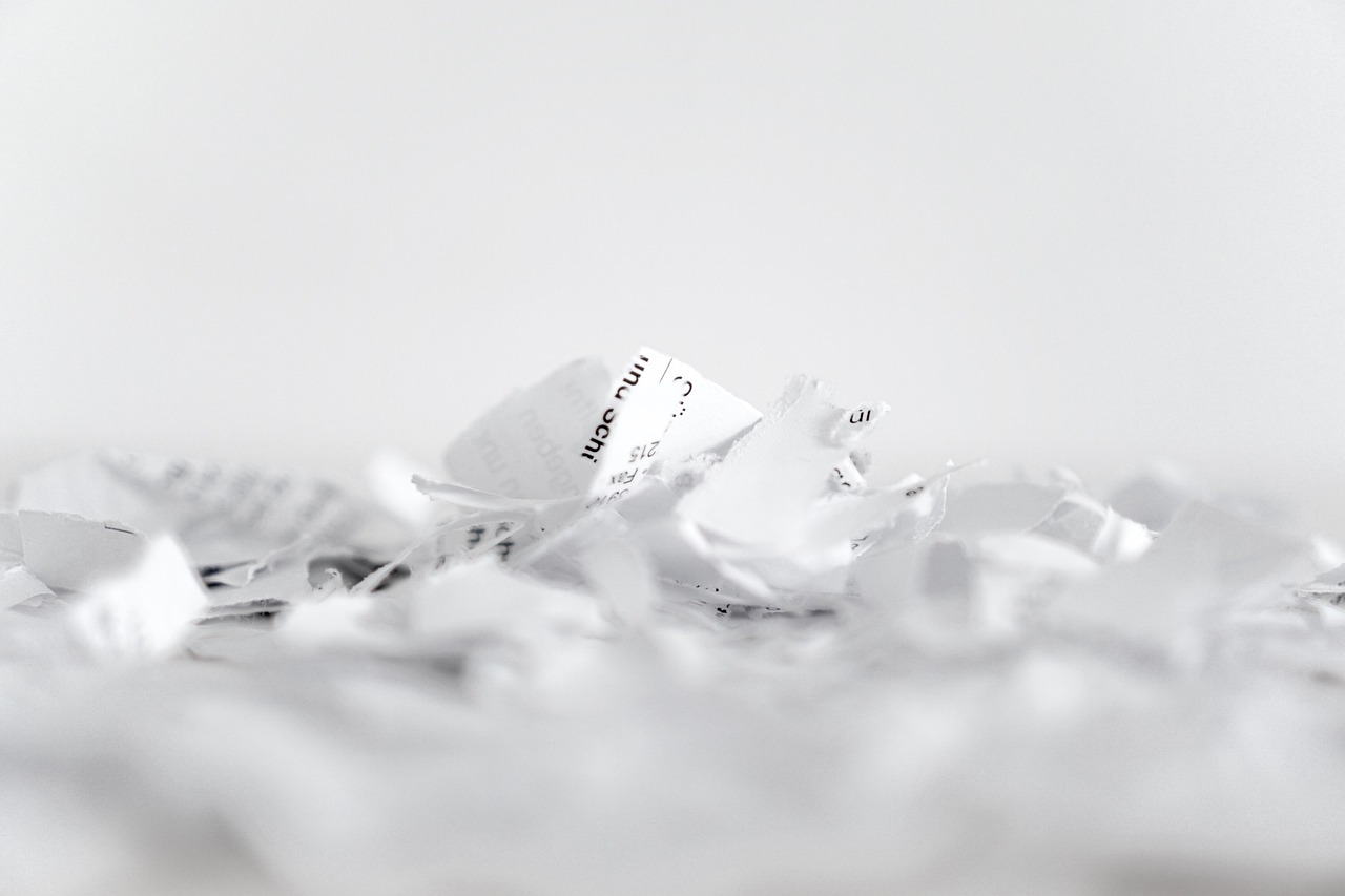 Stacks of letter and legal size paper documents